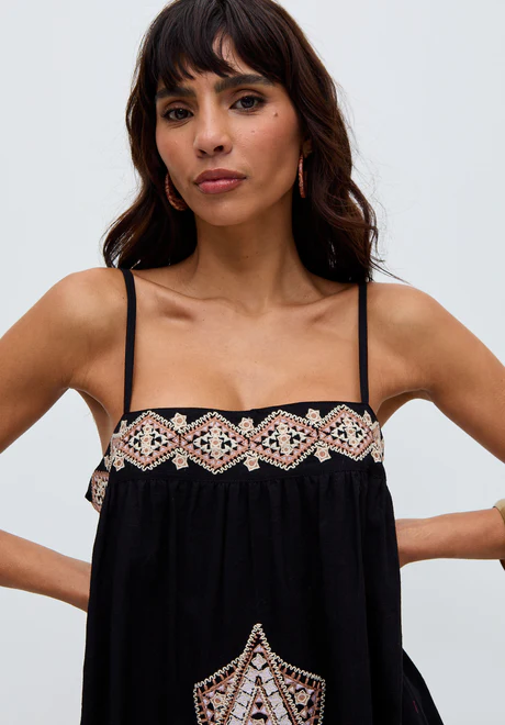 Black maxi dress with sapphire spaghetti straps and embroidery